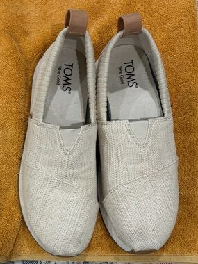 TOMS Slip-On Shoes in Cream with Tan Pull Tab
